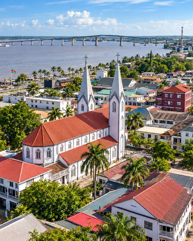 Historic cathedral and Suriname River waterfront in Paramaribo