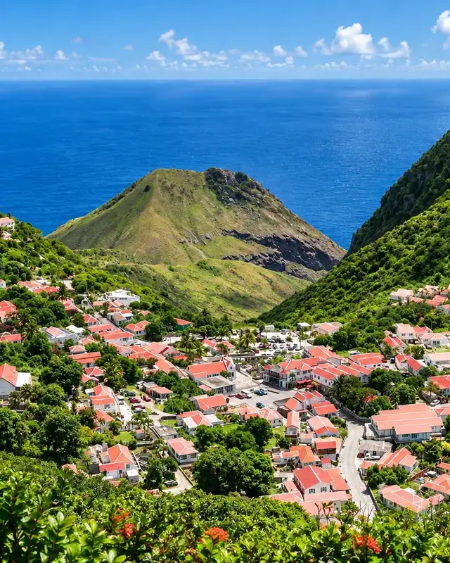 Mountain village with red-roofed homes overlooking the Caribbean Sea in Saba
